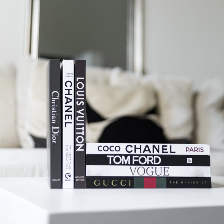 chanel louis vuitton gucci book stack